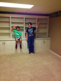 Middle Boy and Oldest saying "goodbye " to the old school room. They look so big in the room now...